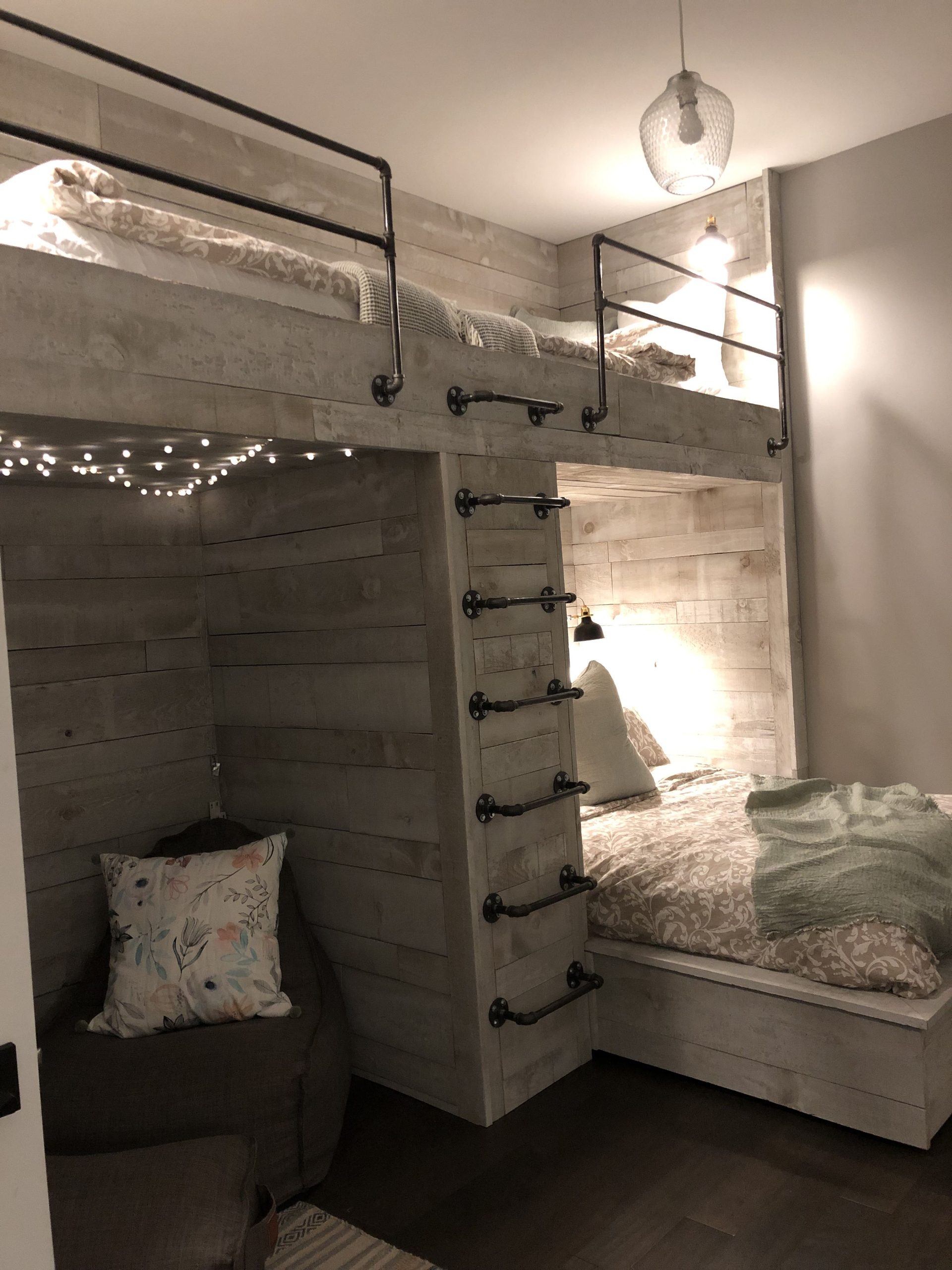 warm colored bedroom design with fairy lights with aesthetic bunk beds