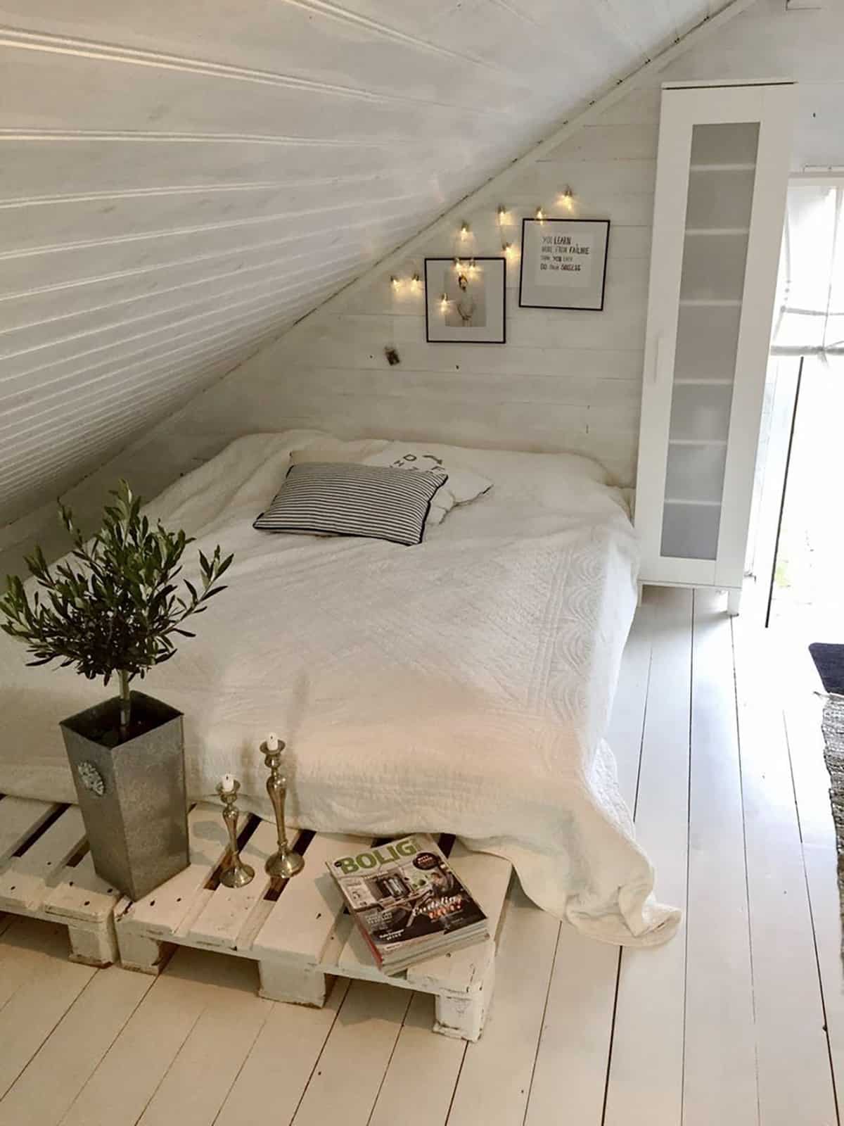 decor light for a bedroom with white slanted walls