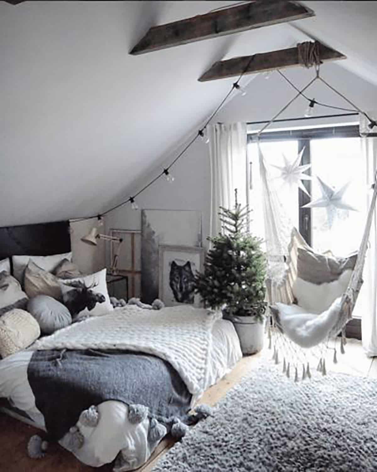 bohemian looking design with fairy lights hanging from slanted walls