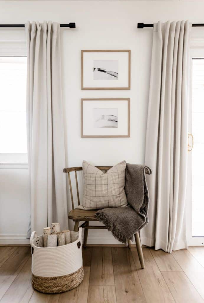 How do I balance an off-center window behind a sofa?