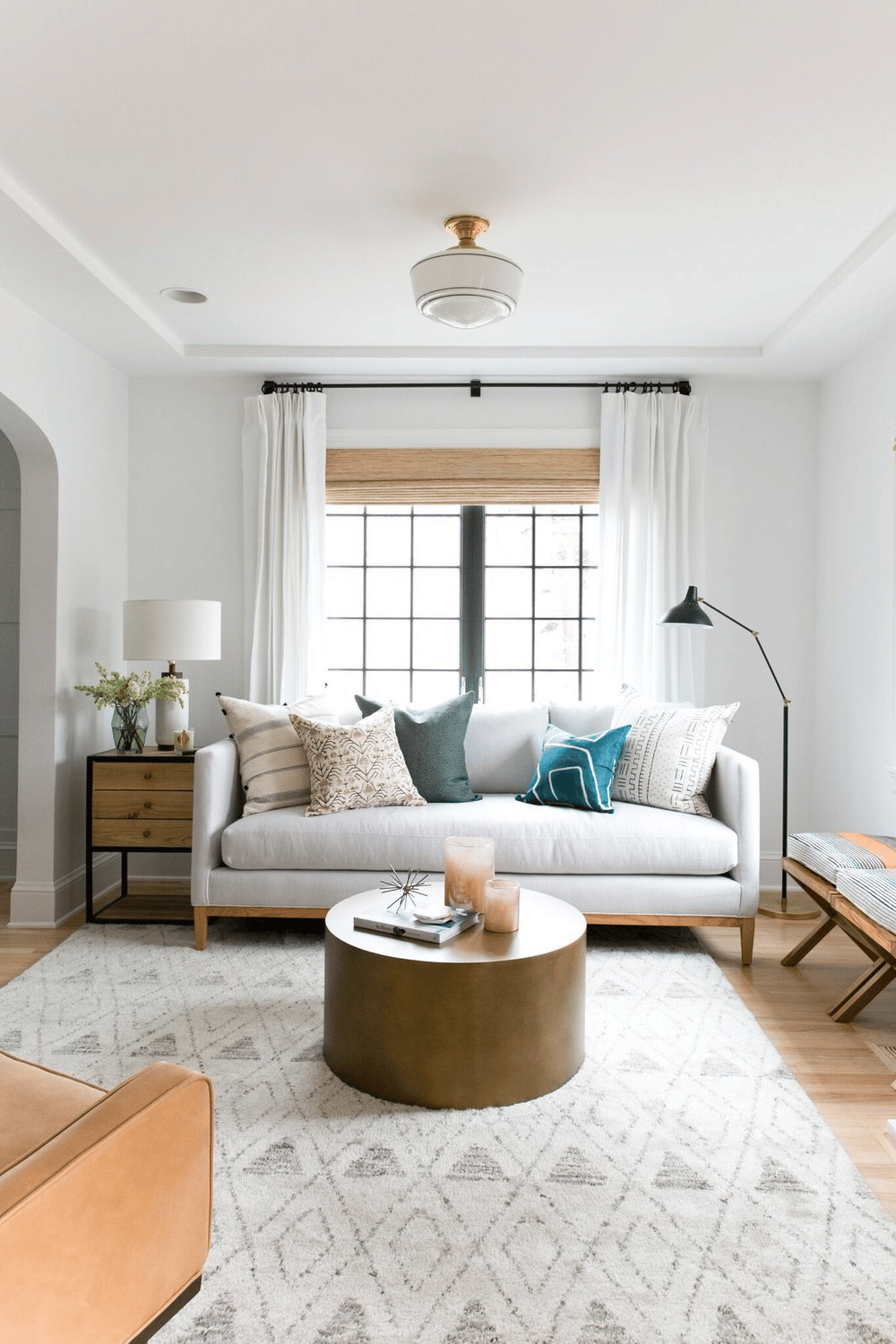 Hide the Off-Center Portion of the Window with Curtains