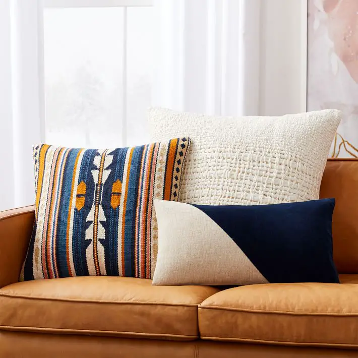 Layer your Sofa and Living Room with an Unexpected Color or Pattern
