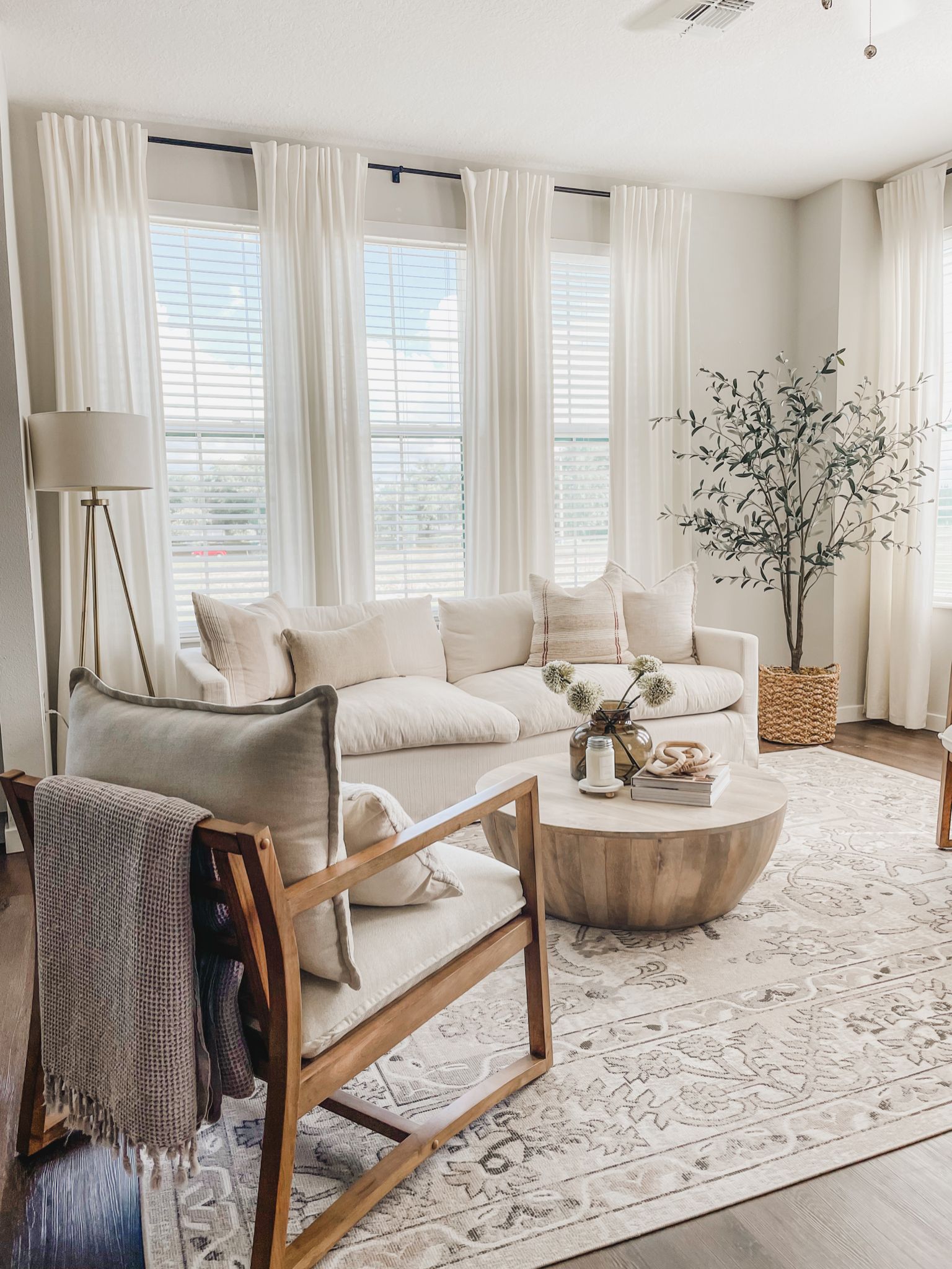 Position a Low Sofa in Front of your Living Room Window to Create a Cozy and Relaxing Space.