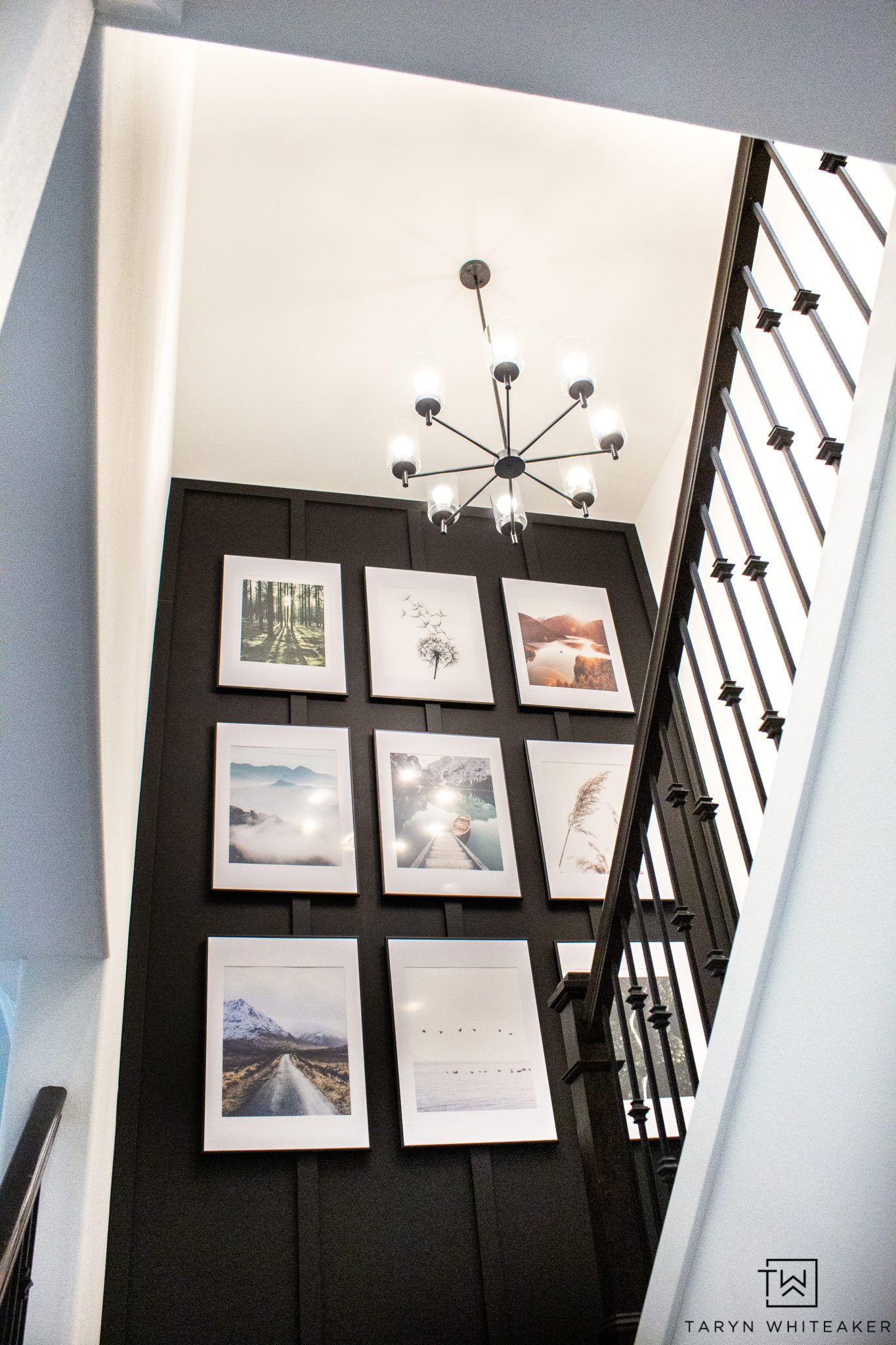 Don’t forget about the lighting! Strategically placed sconces or floor lamps can really enhance the look of a two-story wall.