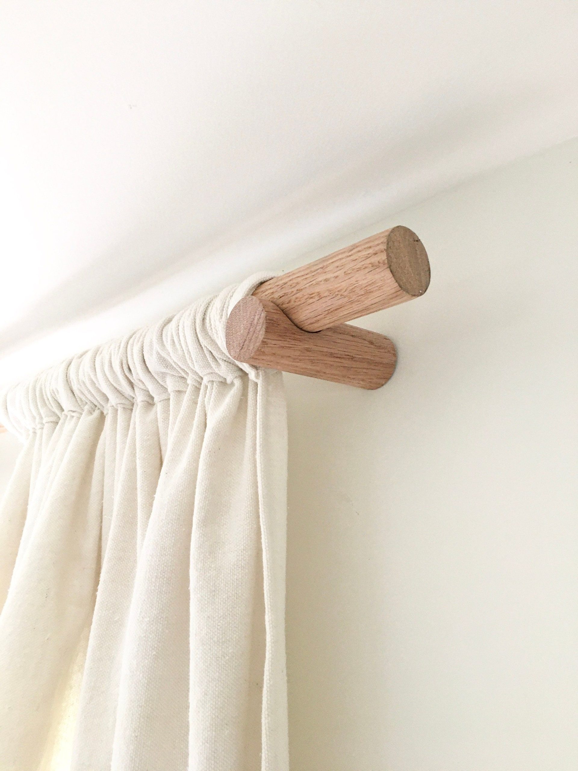 If you want your curtain rods to blend in with the surroundings, then go for a more subdued color.