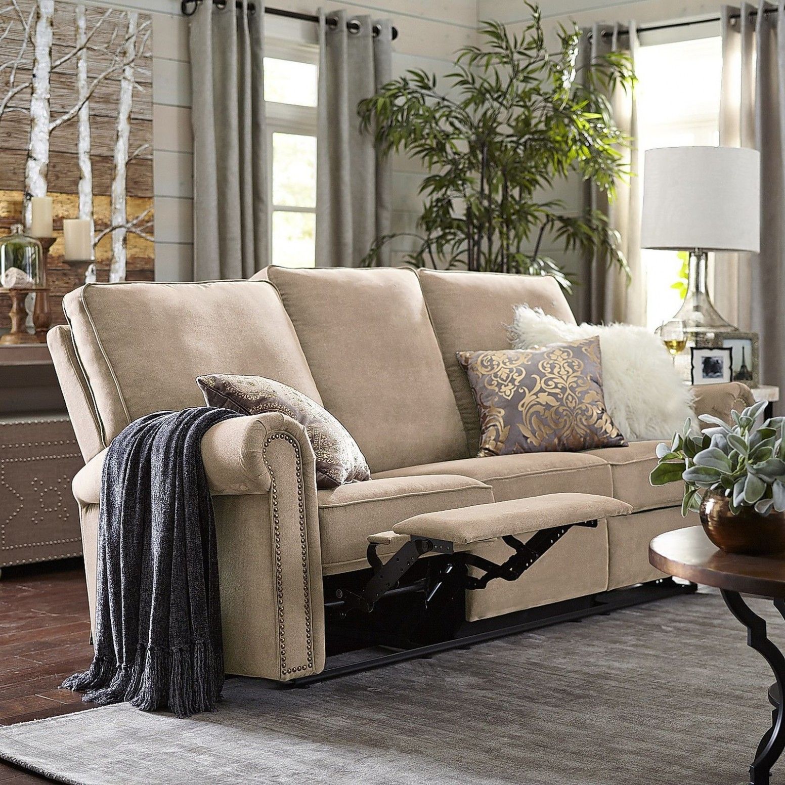 Use Area Rugs to Define the Space and Add Warmth