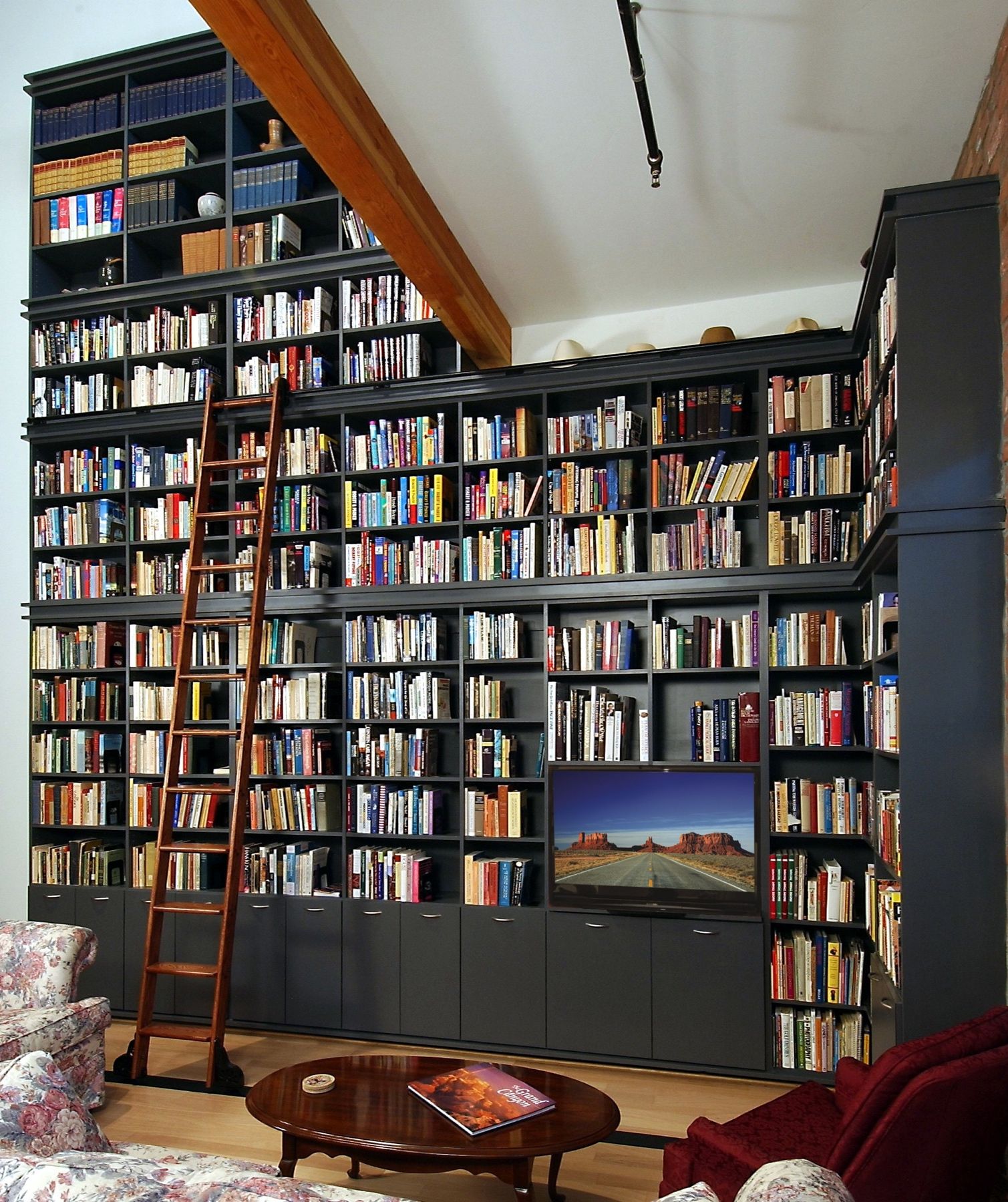 If you have a lot of books or other collectibles, consider displaying them on a two-story wall for added impact.