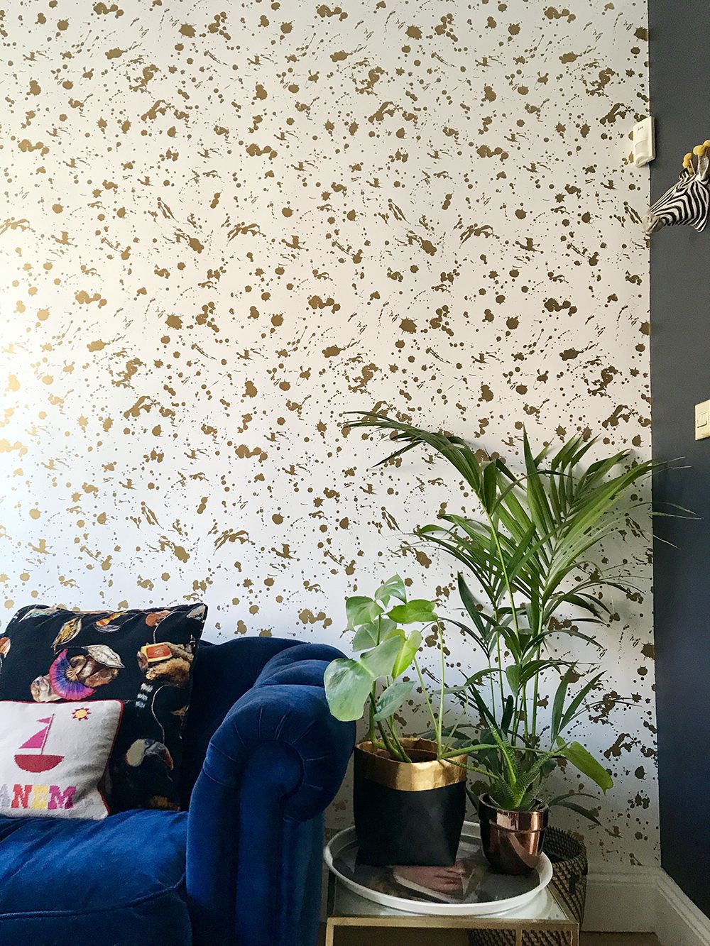 Add an Accent Wall with a Bold Color of Wallpaper and Experiment with Texture and Pattern