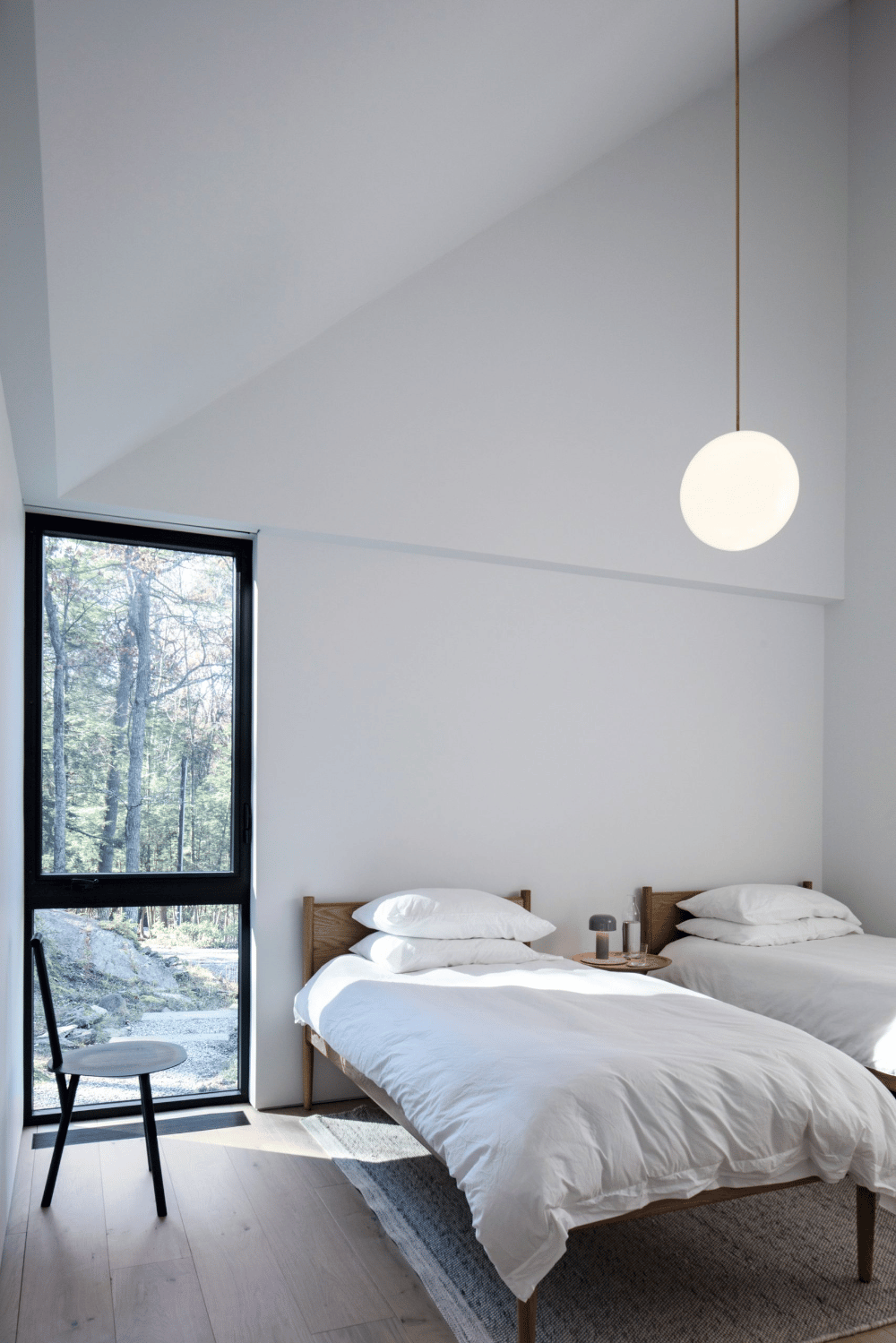 Make the bedroom appear larger by using light colors.