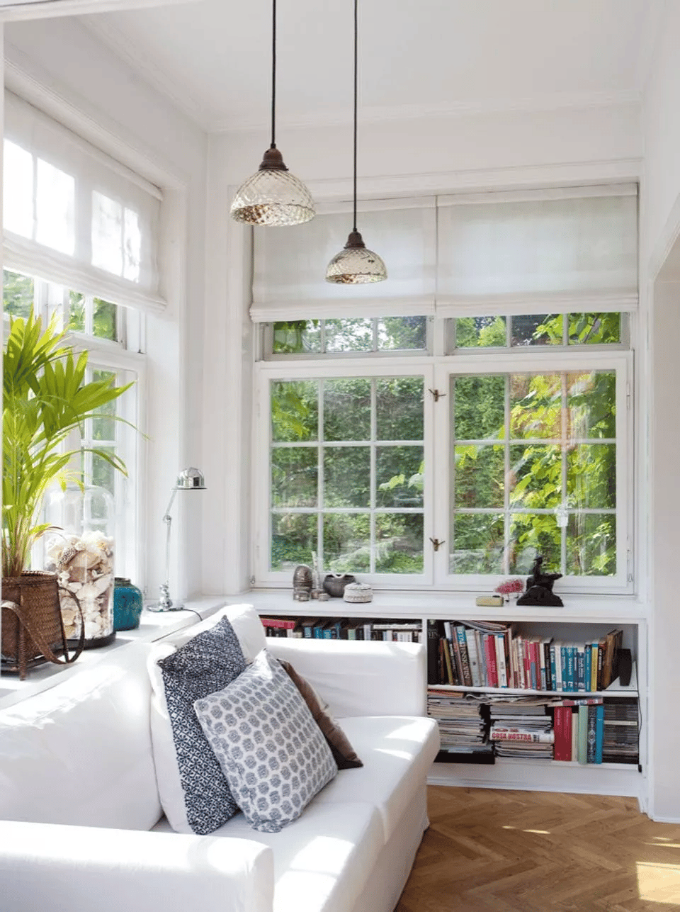 Install a Low Bookshelf or Cabinet to Anchor the Space and Display your Memorabilia.