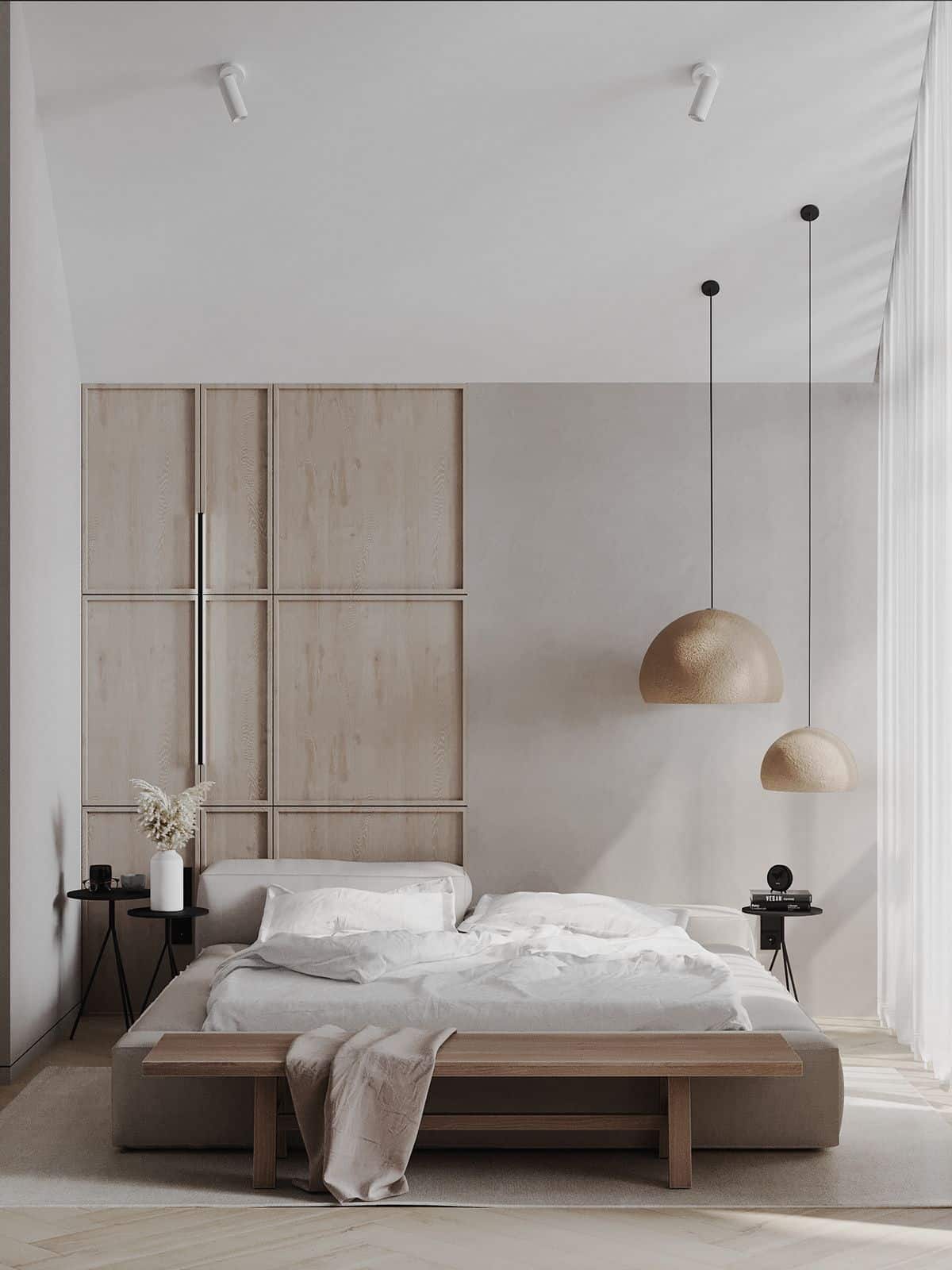 Place a floor lamp instead of the matching nightstand to add some height and drama to the room.