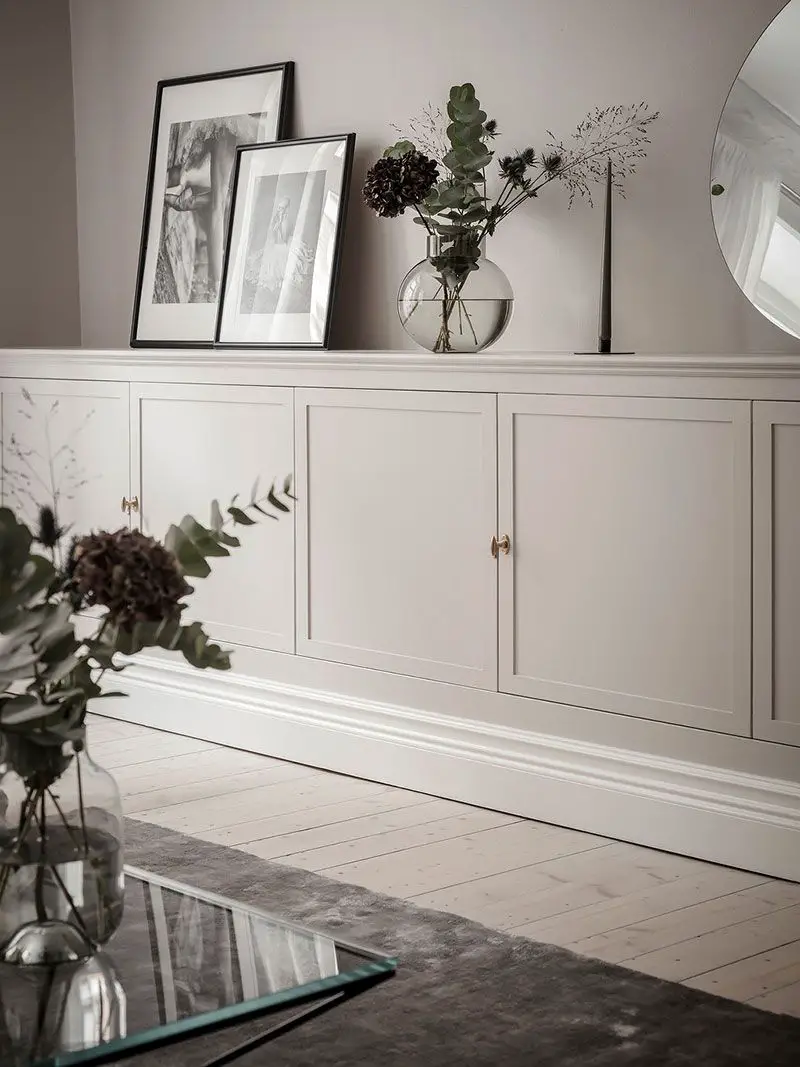 Add Custom cabinetry that fits seamlessly into the wall and make use of every inch of space.