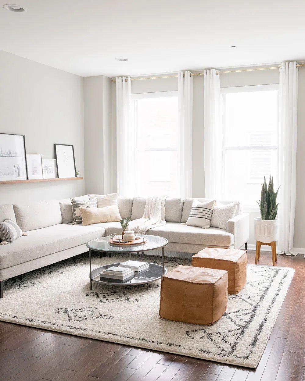Include a comfortable rug to define the space and add some color or pattern.