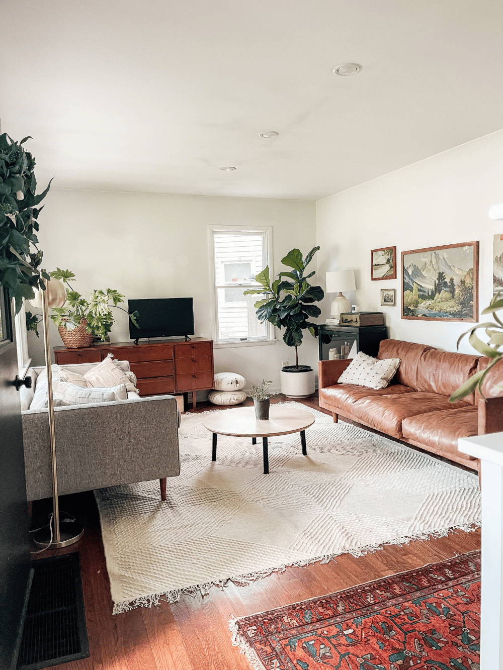 Try stacking two of the same shape and size area rugs in different colors or patterns to create a sense of depth and…
