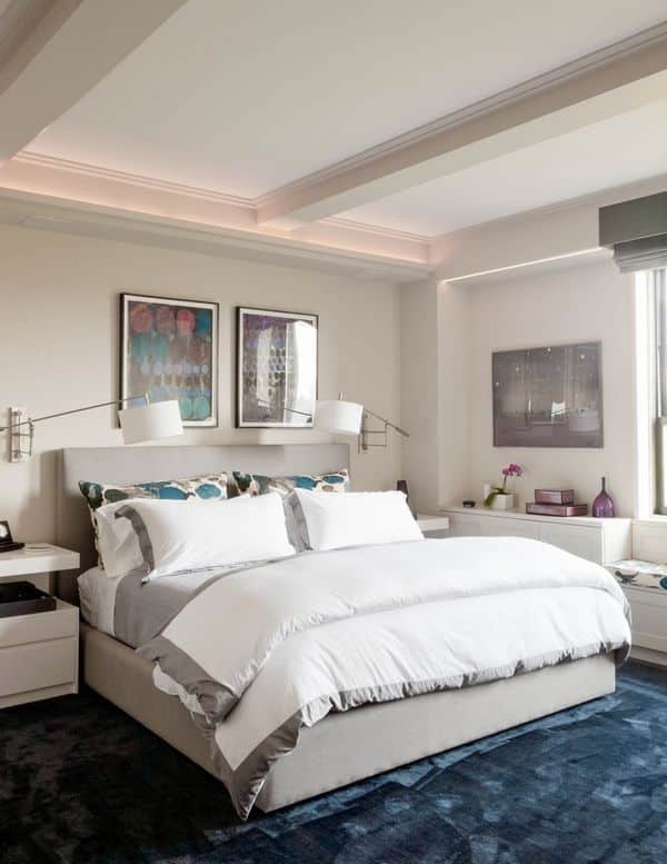 Incorporate furniture pieces in complementary colors, such as a navy blue leather sofa, a white bed frame, and more.