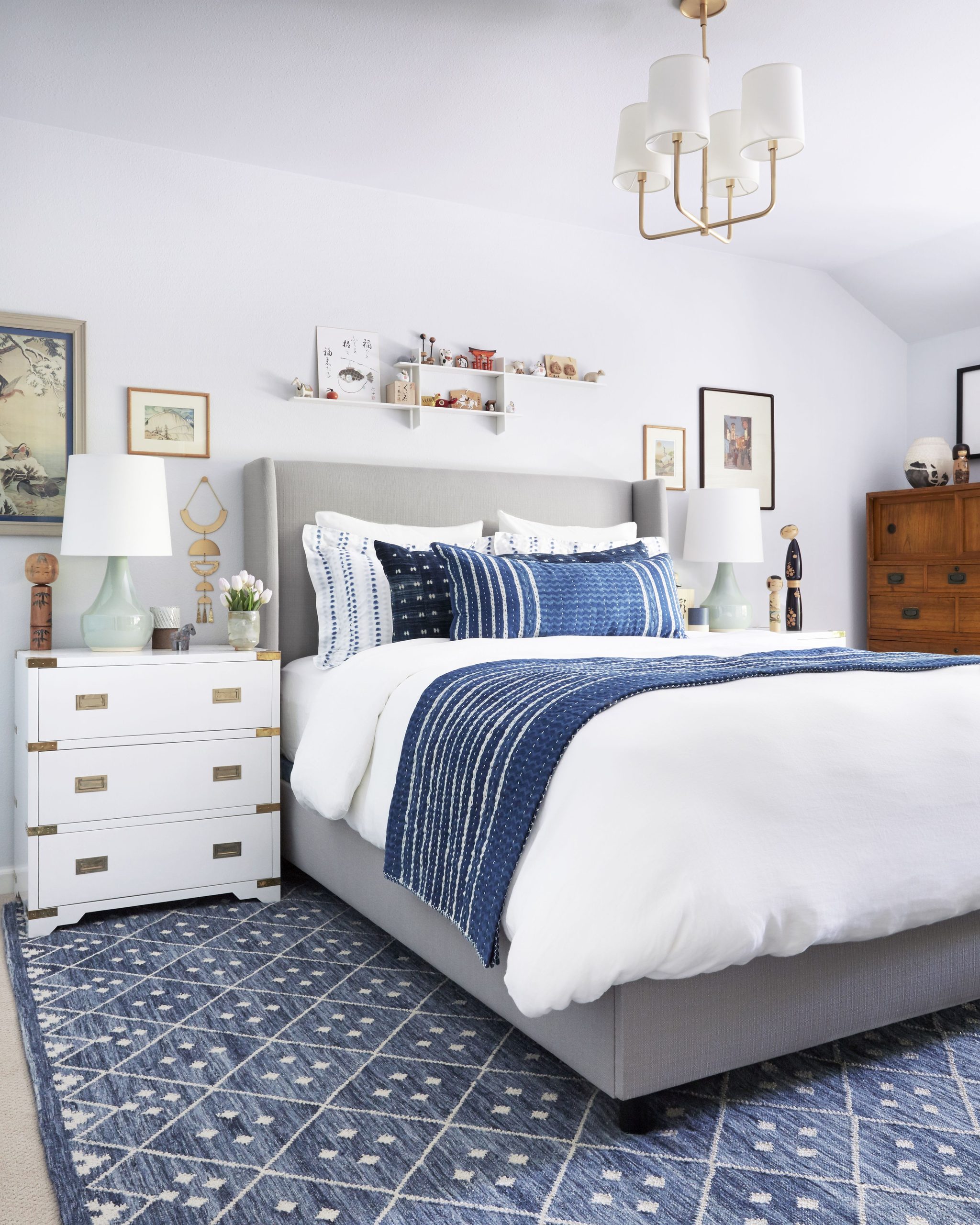Use wall art and light fixtures in your room to bring out the blue color in your carpet.
