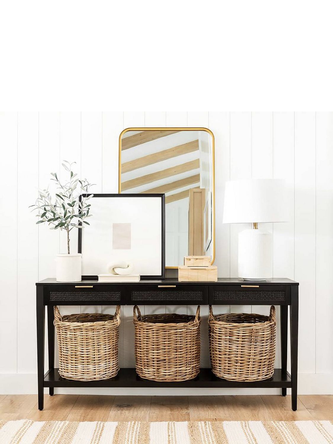 How do you decorate behind a TV console?
