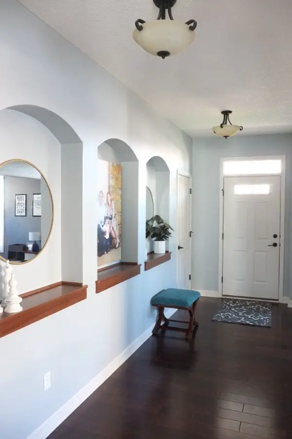Put up a mirror which will create the illusion of space and light.