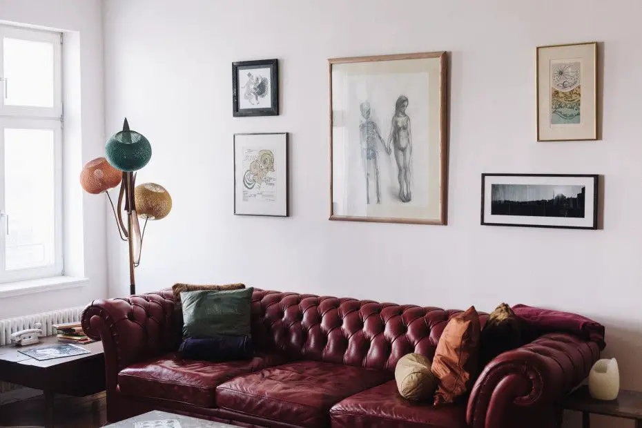 Add some lighting. An overhead chandelier or floor lamp can provide a warm glow and help to complete the look of your brown…