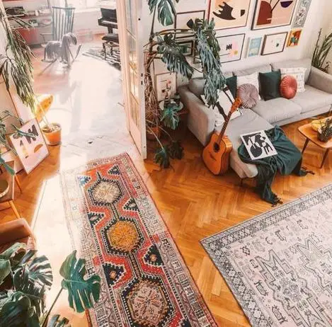 Use a hallway runner rug or two narrow rugs to connect and match two distinct living areas while also establishing separate…