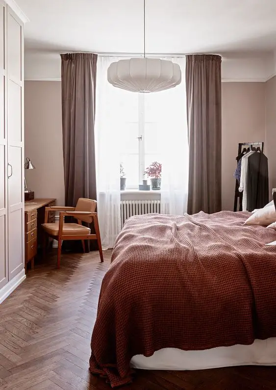 Pale pink wall color is soft and romantic, perfect for a feminine space.