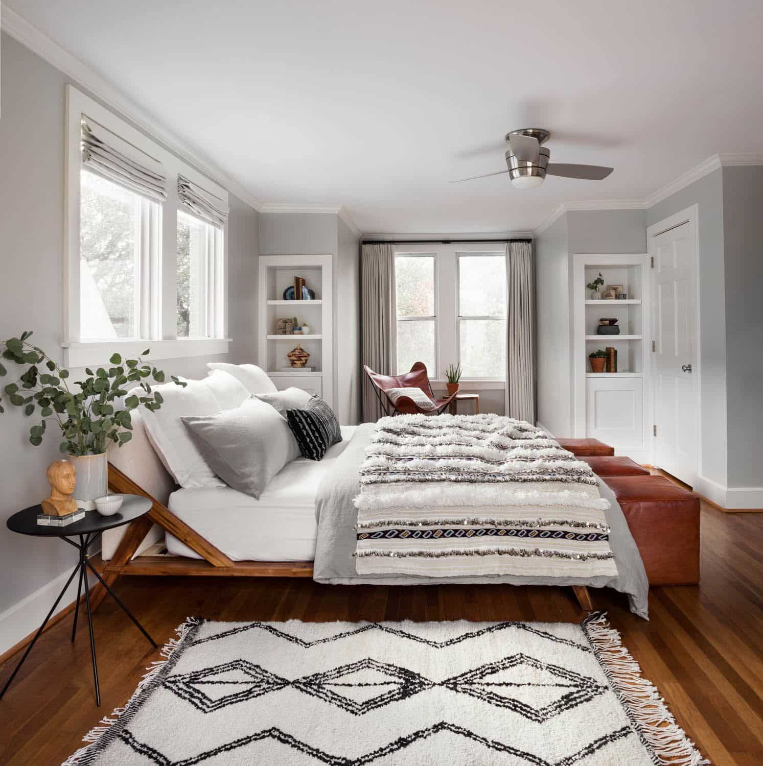 Restore the natural glow of dark wood flooring by adding lighter shades to the surrounding decor or light gray walls.