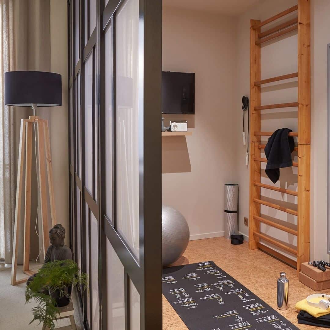 Room dividers are great for hiding exercise spaces in the living room.