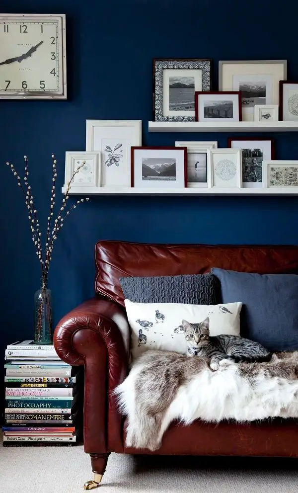 Choose artwork that will add visual interest to your design. Try pieces with warm gold tones and stark black lines if you…