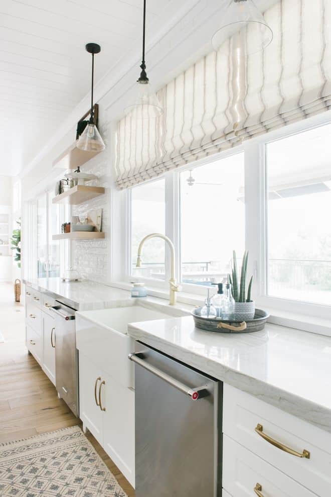 Try a valance for an easy yet stylish way to enhance your kitchen window design frame while also keeping out any unwanted…