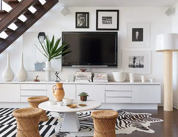 An asymmetrical TV stand would look beautiful with a circular coffee table!