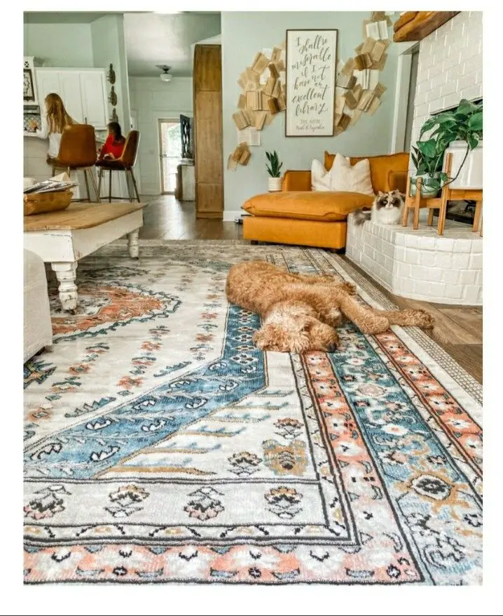 Contrast light and dark colors within a single rug to help define the area and give more depth.