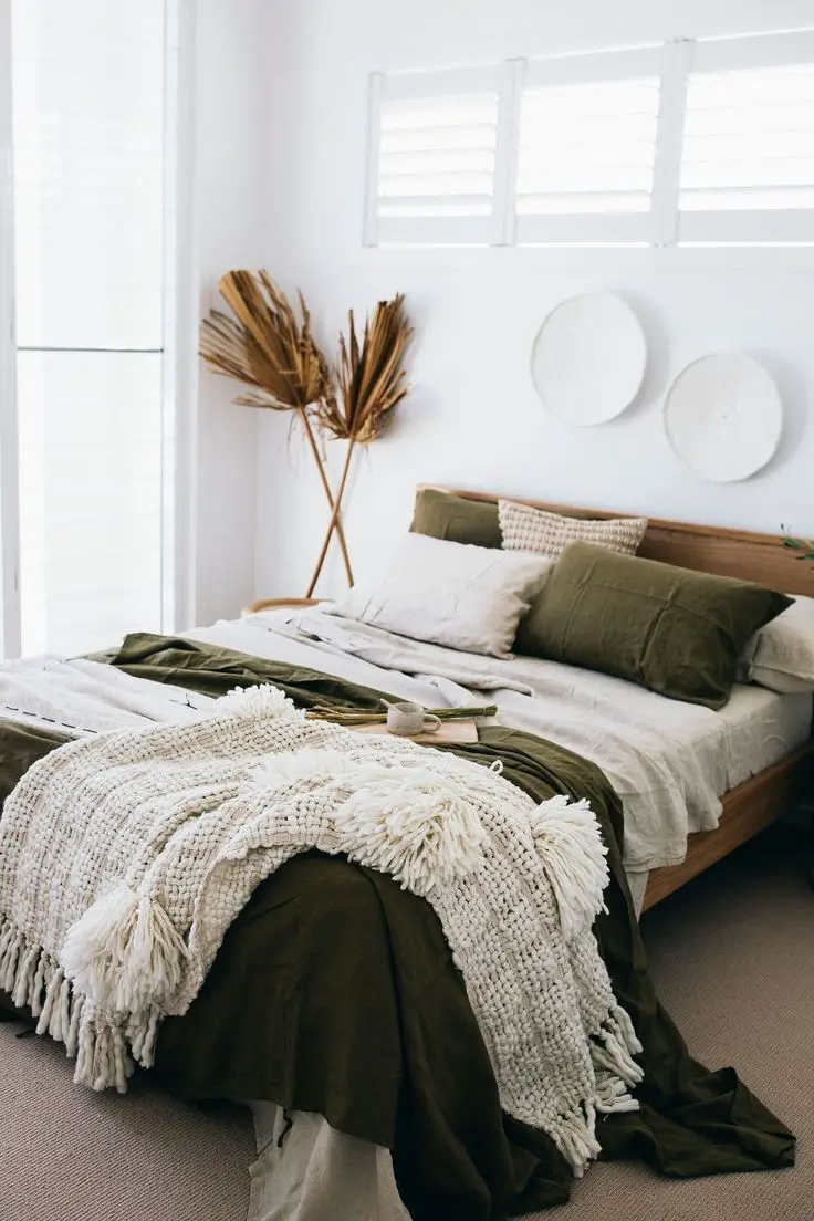Place it at the foot of your bed and use throw blankets instead for an extra layer of warmth.
