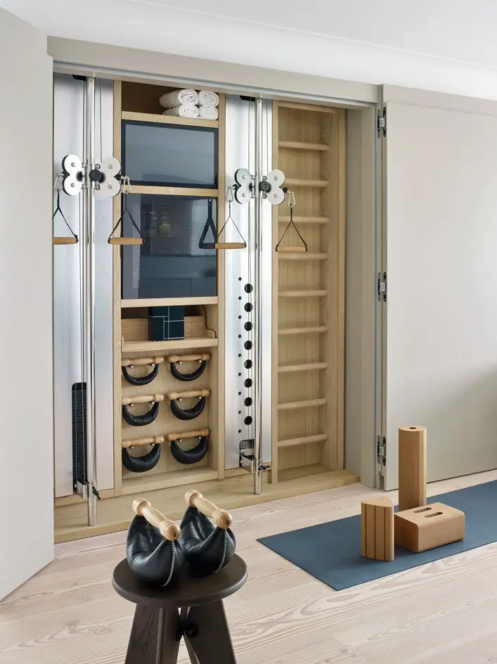 You can find custom-built cabinets that are designed as home gym storage.