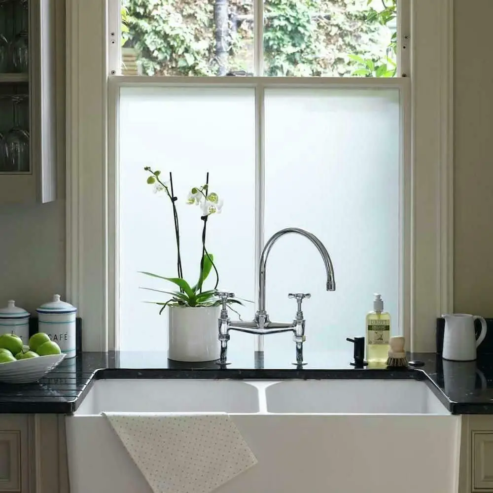 Install frosted window cling film for a modern and unique decor that will also give you some privacy from outside eyes.