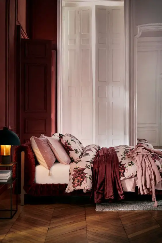 Burgundy accent color brings out the richness of the dark wood, creating a classic look.
