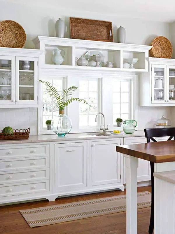 What type of decorations should I avoid for my kitchen window?
