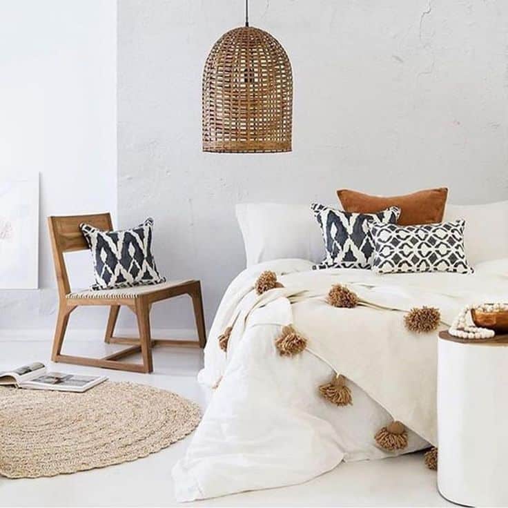 When throw-blanket styling, gently fold your throw blanket in half and then drape it across at an angle for a beautiful look!