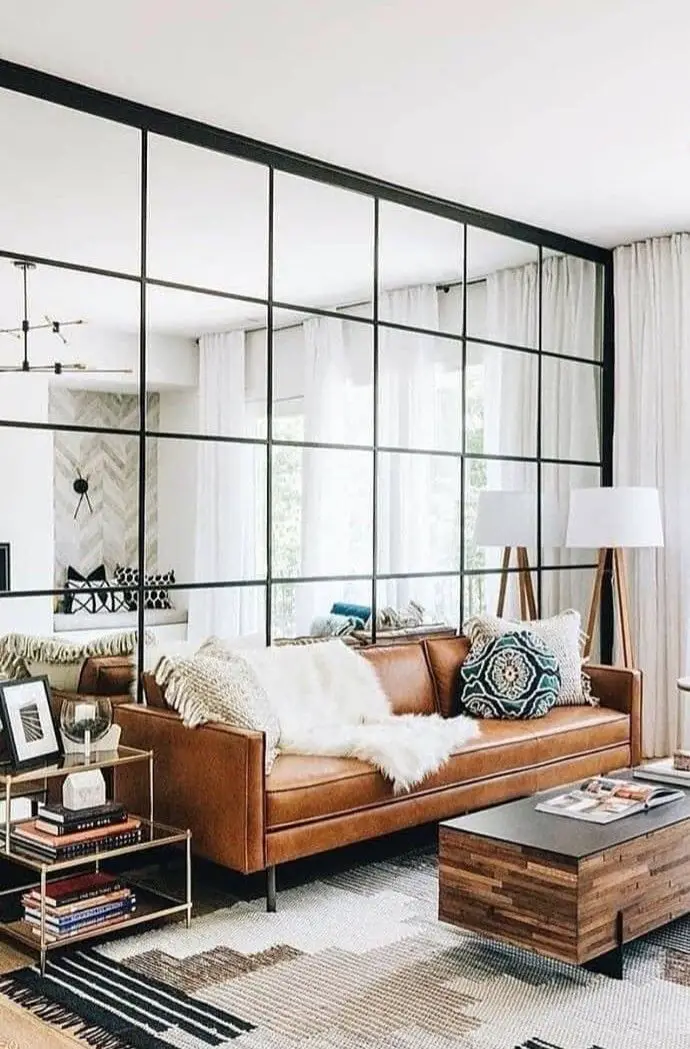 Incorporate Mirrors in the Living Room: Using a combination of mirrors and other reflective surfaces can make a living room…