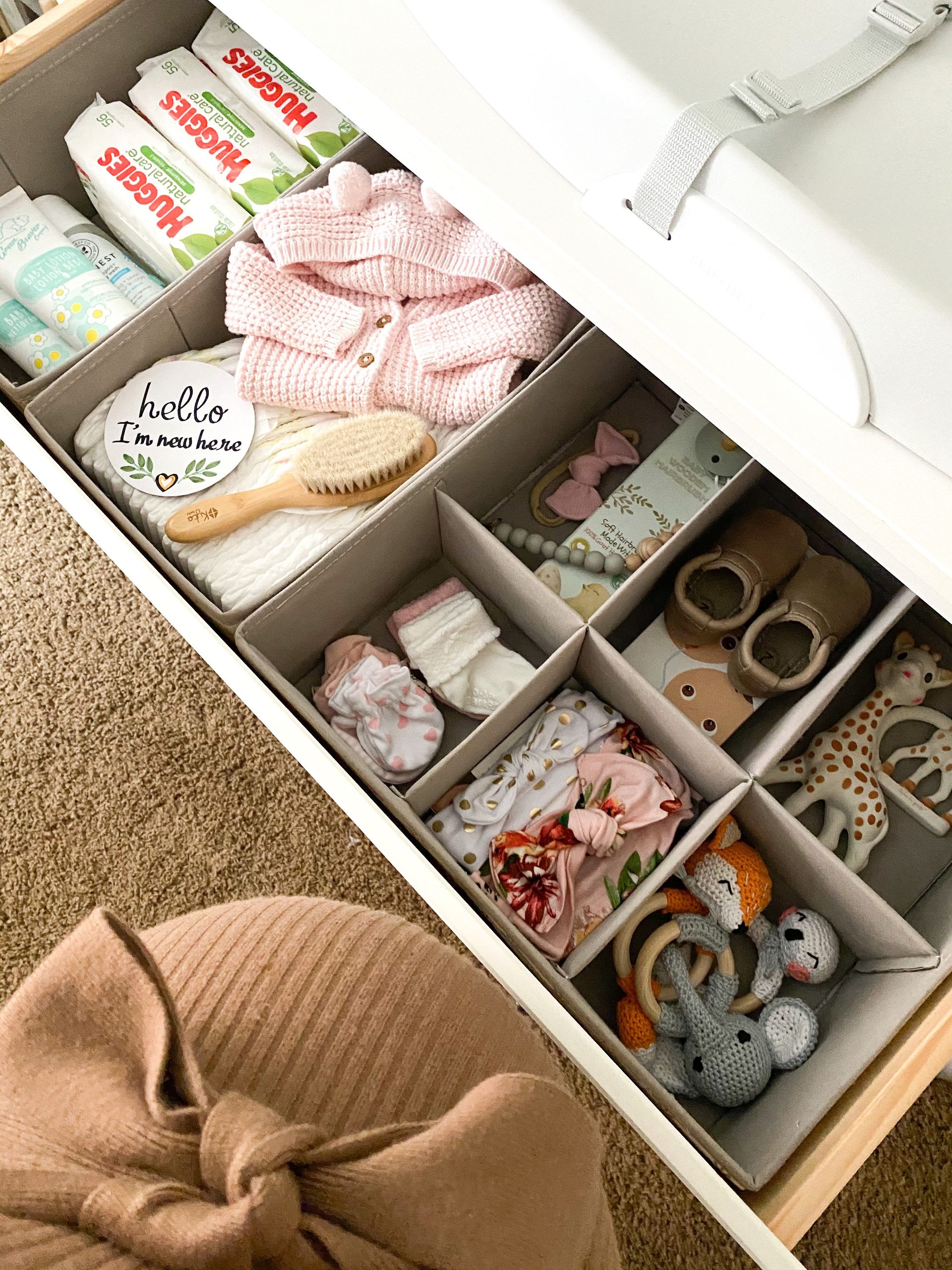 Invest in drawer dividers and keep small accessories like socks, hats, and hair bows organized within drawers.