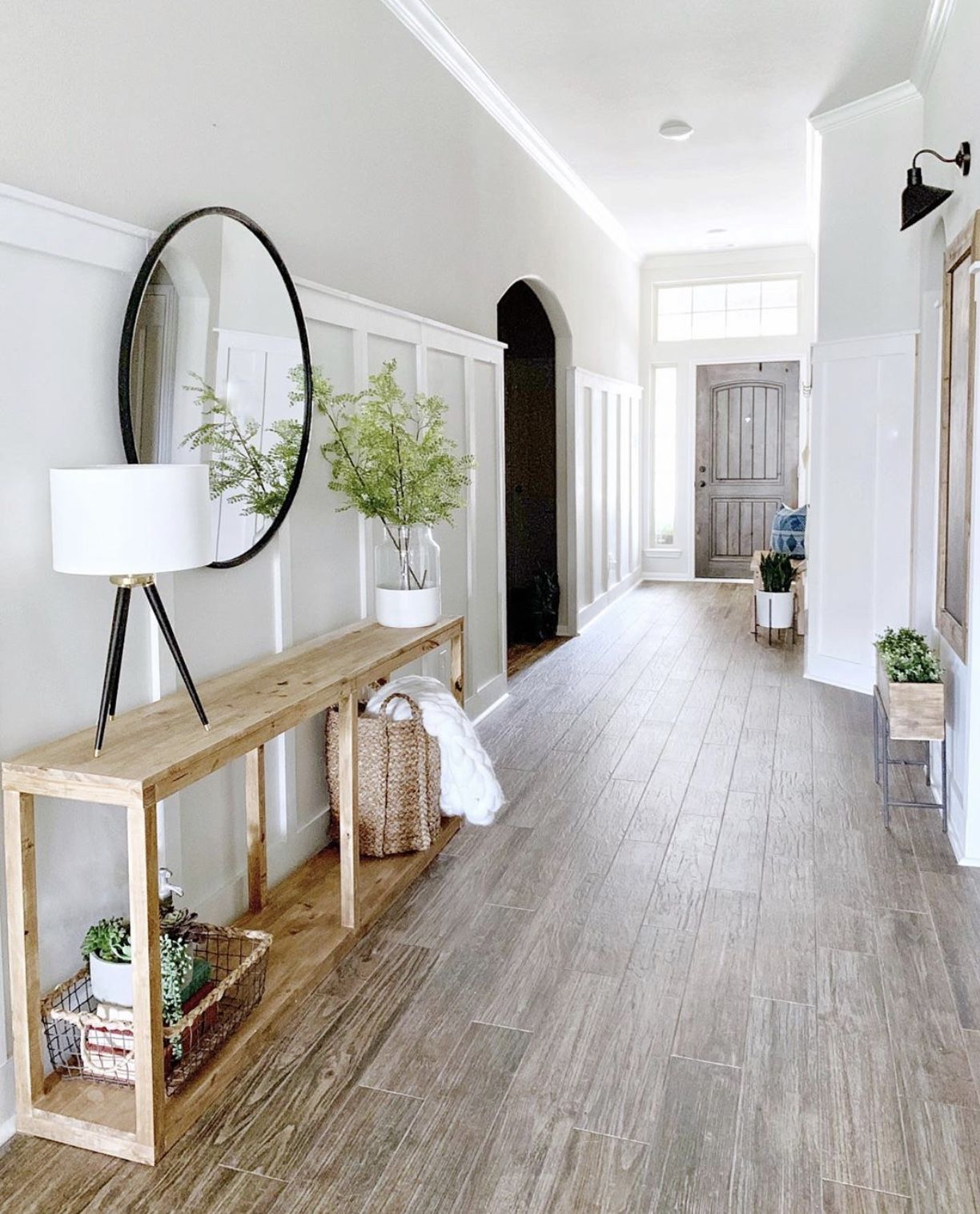 Utilize both vertical and horizontal space for storage, like shelves or cubbies for mail and other items.