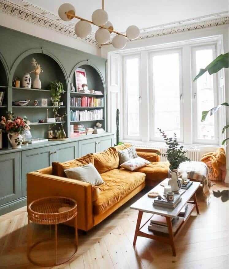 Use warm colors such as orange and yellow in living rooms on furniture and accents to create a cozy and inviting atmosphere.