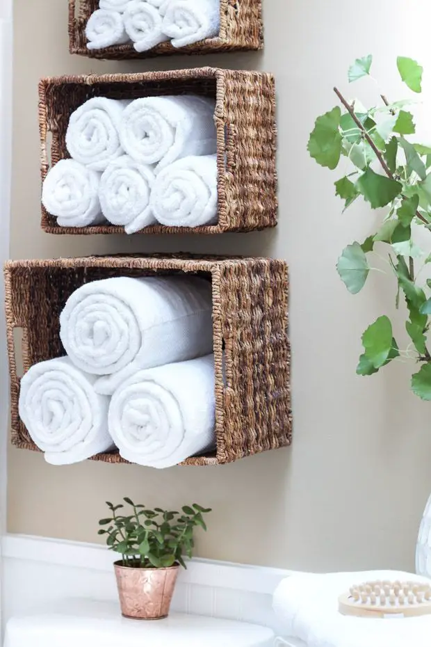 Show your linens off by folding or rolling them properly on shelves behind the sink or elsewhere.