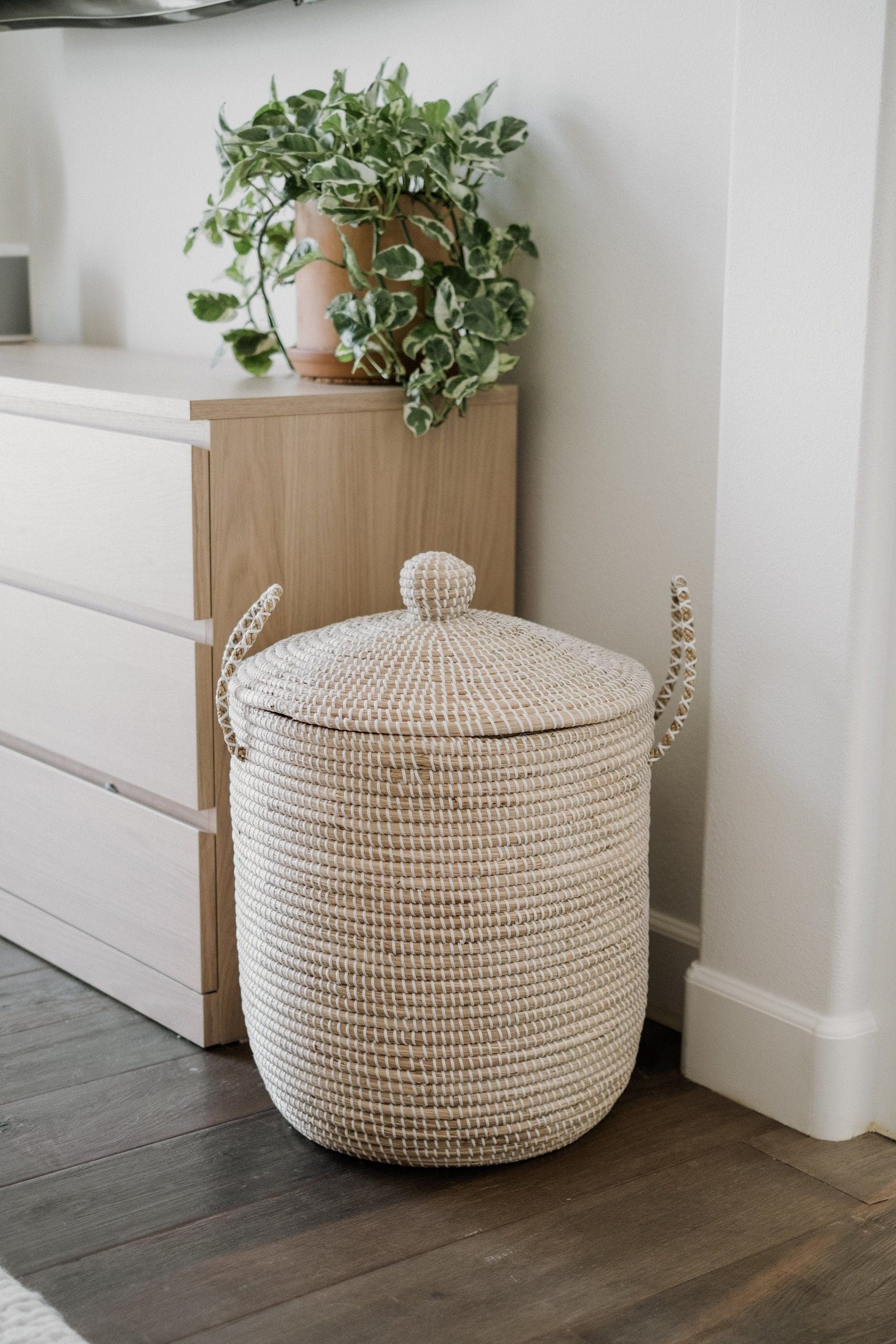 A hamper can be an ideal solution for storing clean, folded towels.
