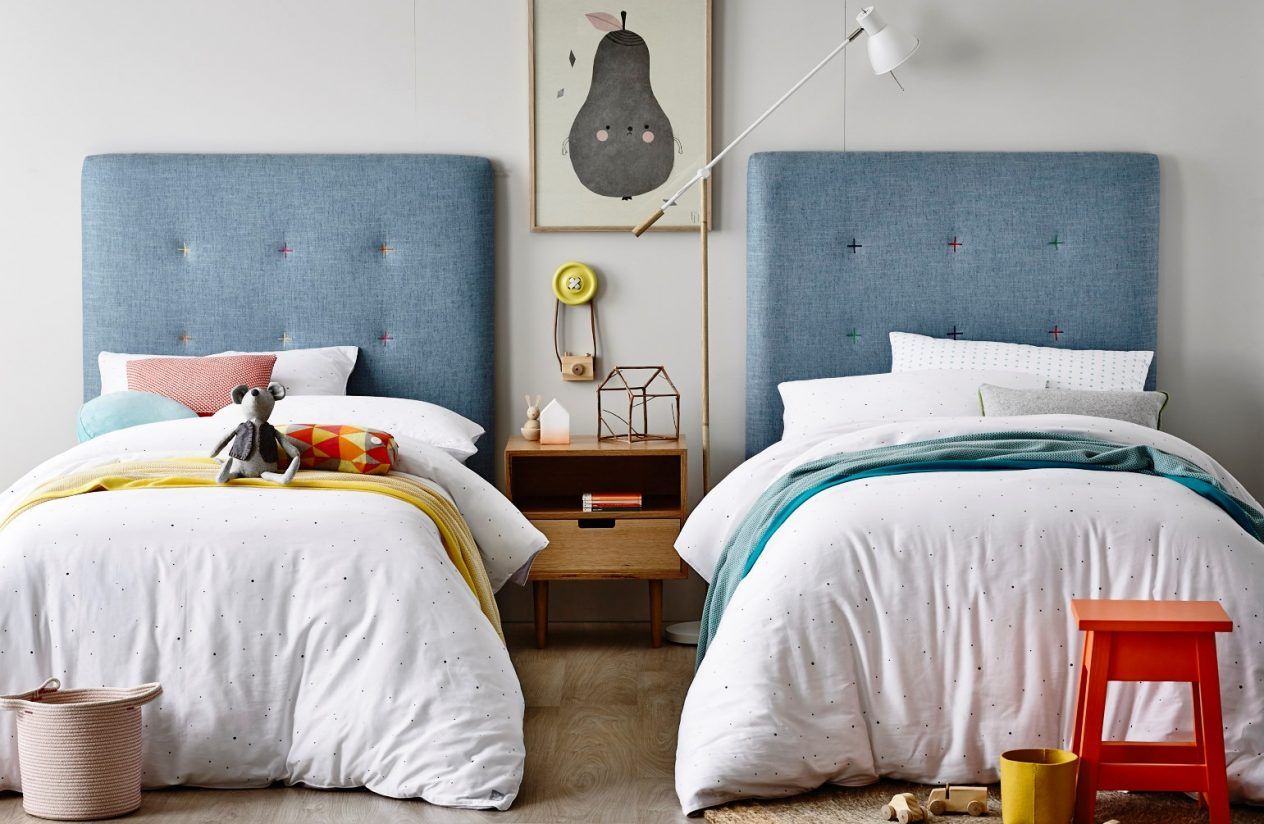 Adjustable lighting fixtures draw attention away from certain areas while creating barriers between beds or desks when…