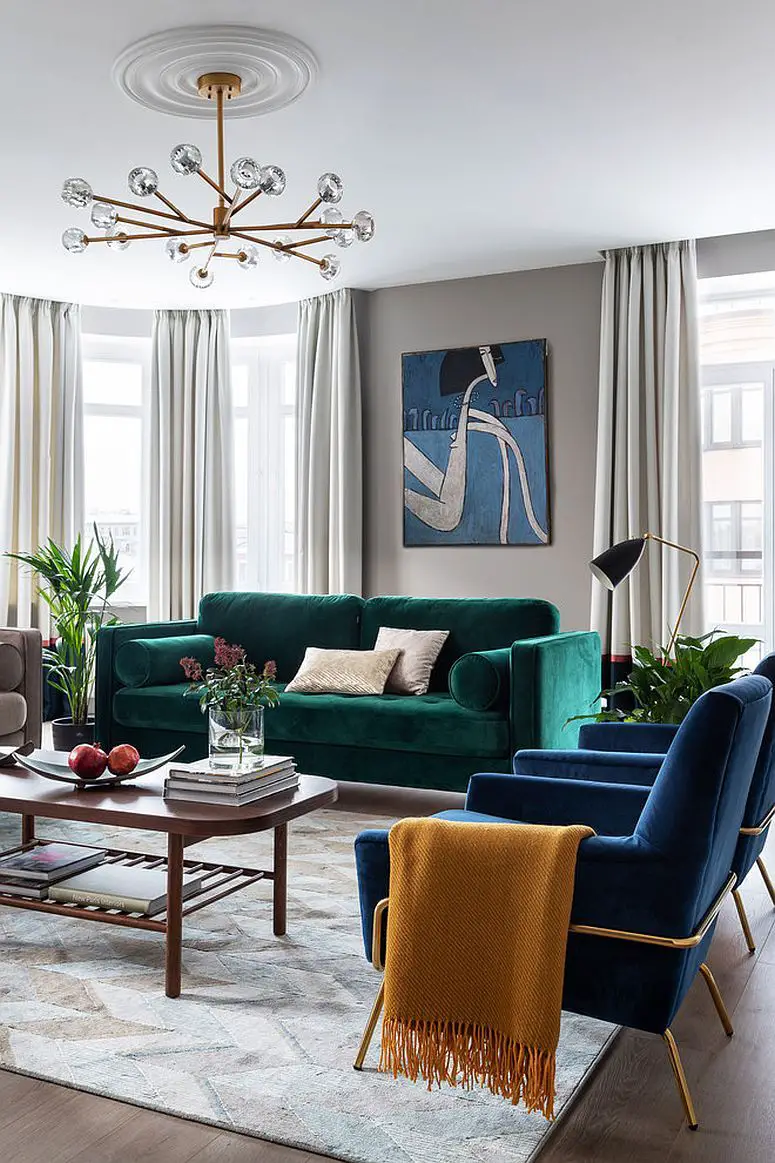 Match fabrics on the accent chairs and sofas to create visual unity, such as pairing plaid-patterned accent chairs with a…