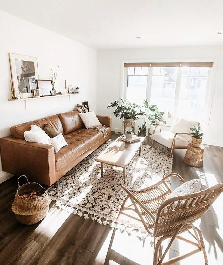 Using warm water with a mild detergent like Dove soap is recommended for cleaning white leather couches.
