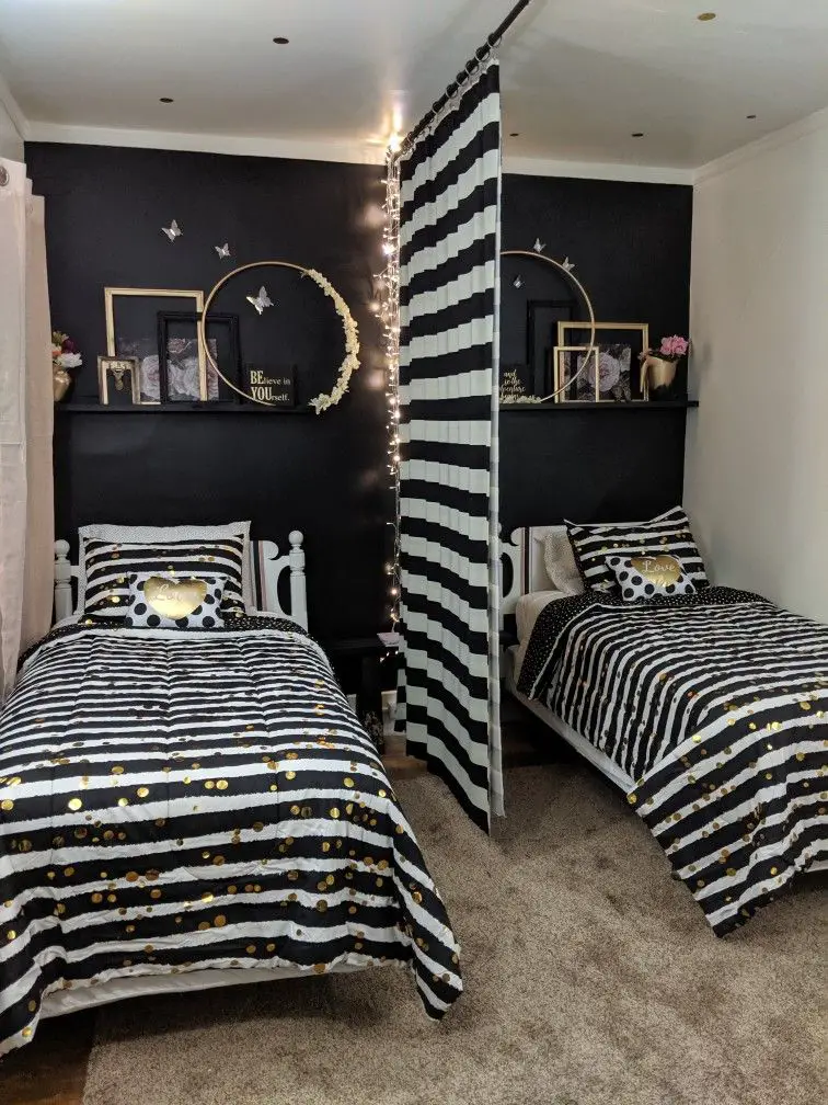 Add privacy features like drapes hung on rods providing light blockage & sound dampening benefits!