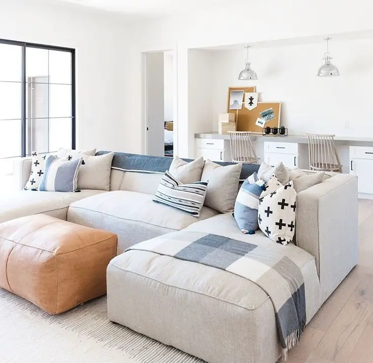 Hang mirrors to reflect light and give the illusion of more space.