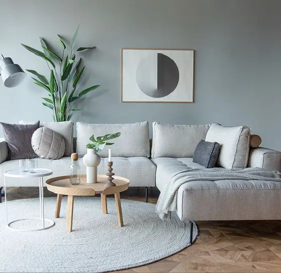 Pale Blue Paint with Light Stained Hardwood Flooring