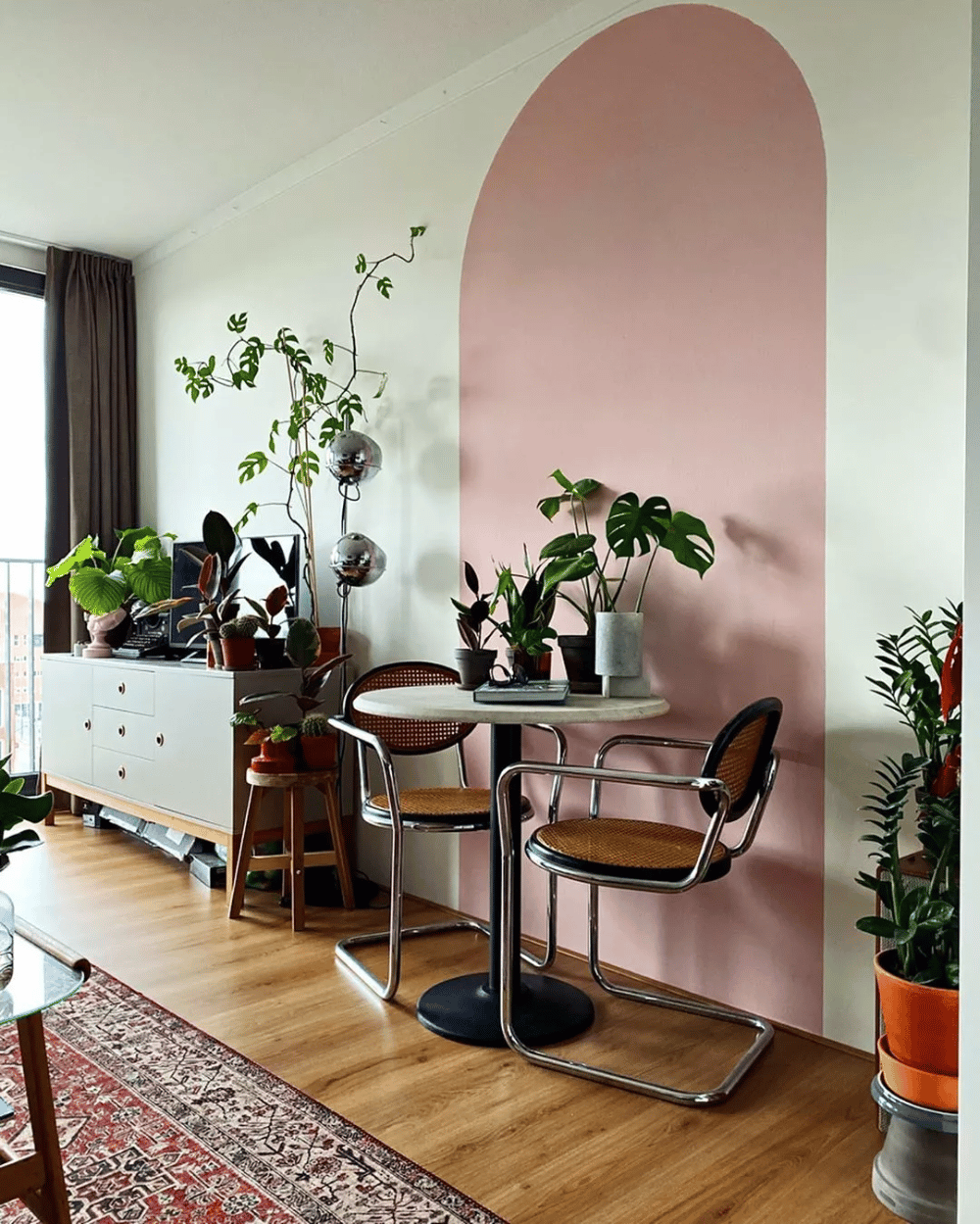 Adding nature around a focal point can make styling and designing a room easier and create a more cohesive space.